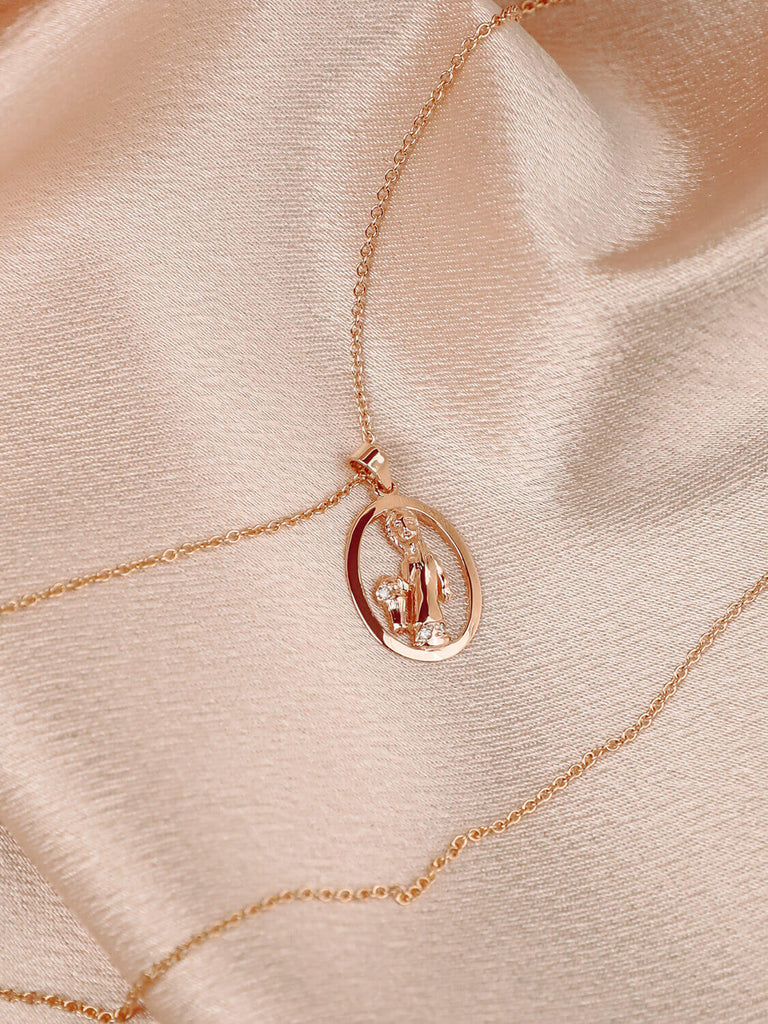 detail photo of Aquarius zodiac charm necklace with diamonds in 14k yellow gold