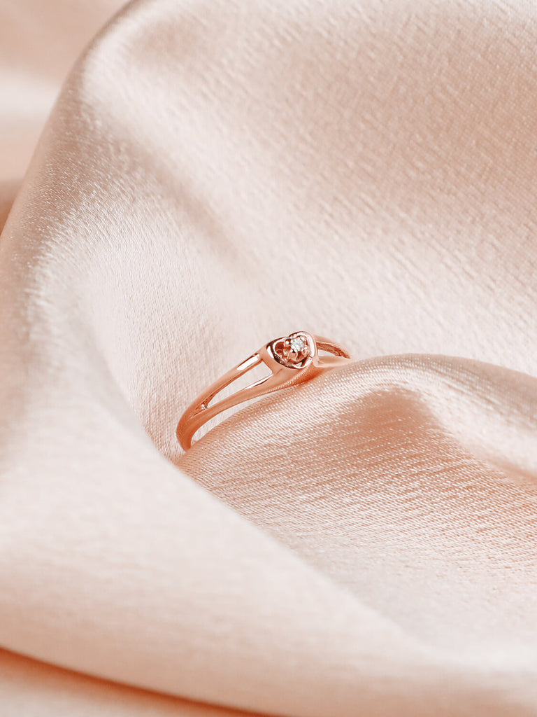 woman's diamond heart promise ring in 14k rose gold
