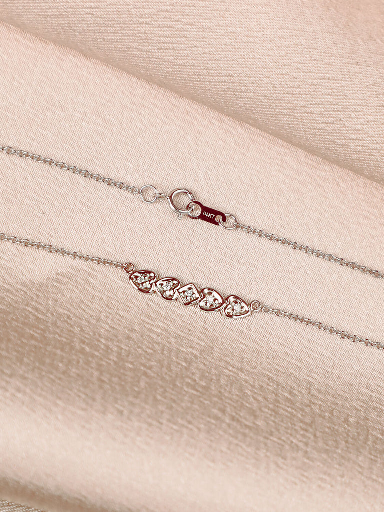 detail photo of heart bar necklace in 14k white gold 