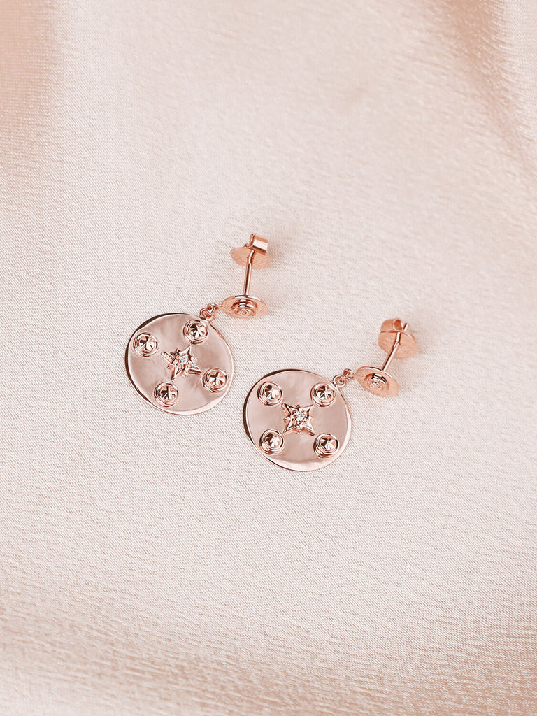 detail photo of midnight celestial earrings in rose gold