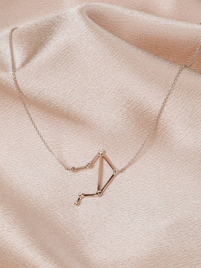 Close detail photo of sterling silver Libra zodiac constellation necklace from ModSet jewelry