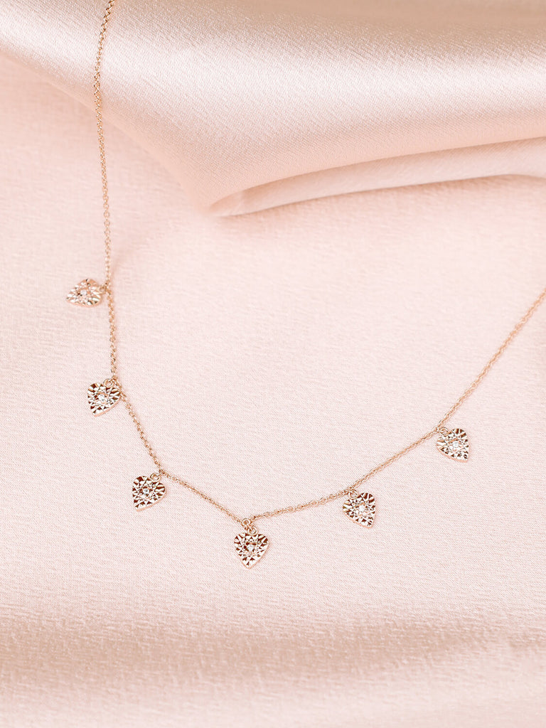 sparkling heart diamond necklace in 14k yellow gold with diamond in the center